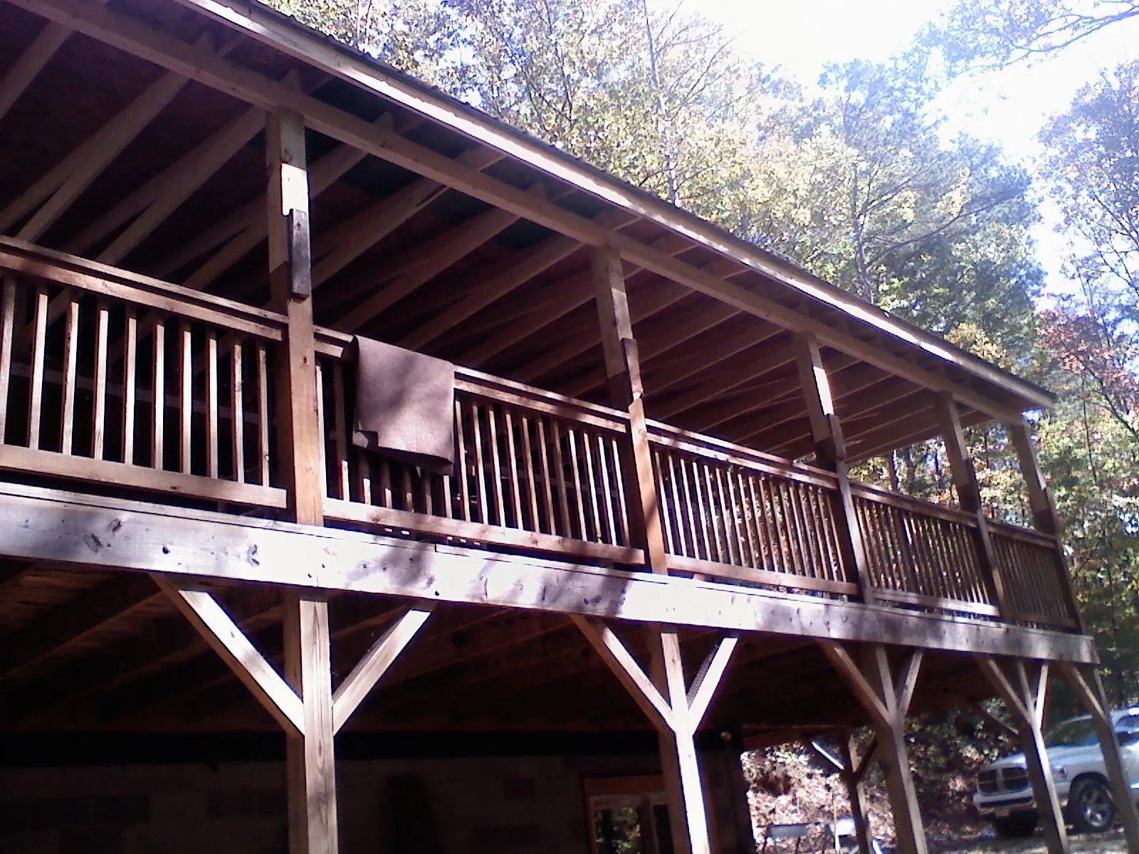 Timber framing under a new elevated porch and deck — Roof Leak Repair in Bethany by Roofing Brothers